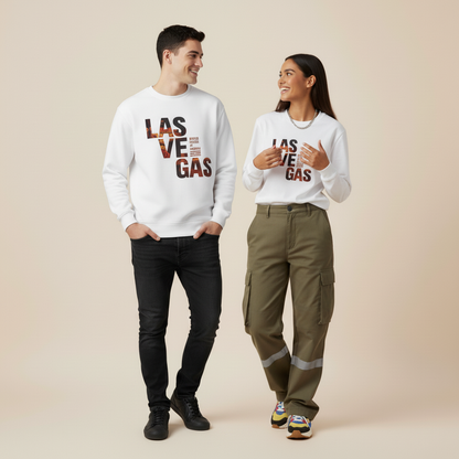 Two people wearing white sweatshirts with 'LAS VEGAS' text on a beige background