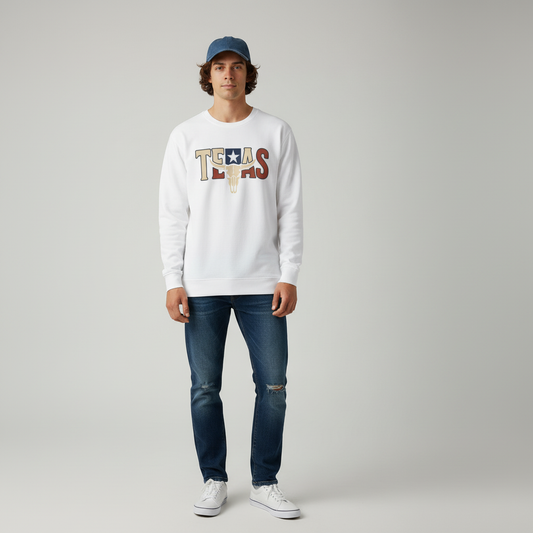 Person wearing a white sweatshirt with 'Texas' print and blue jeans on a plain background